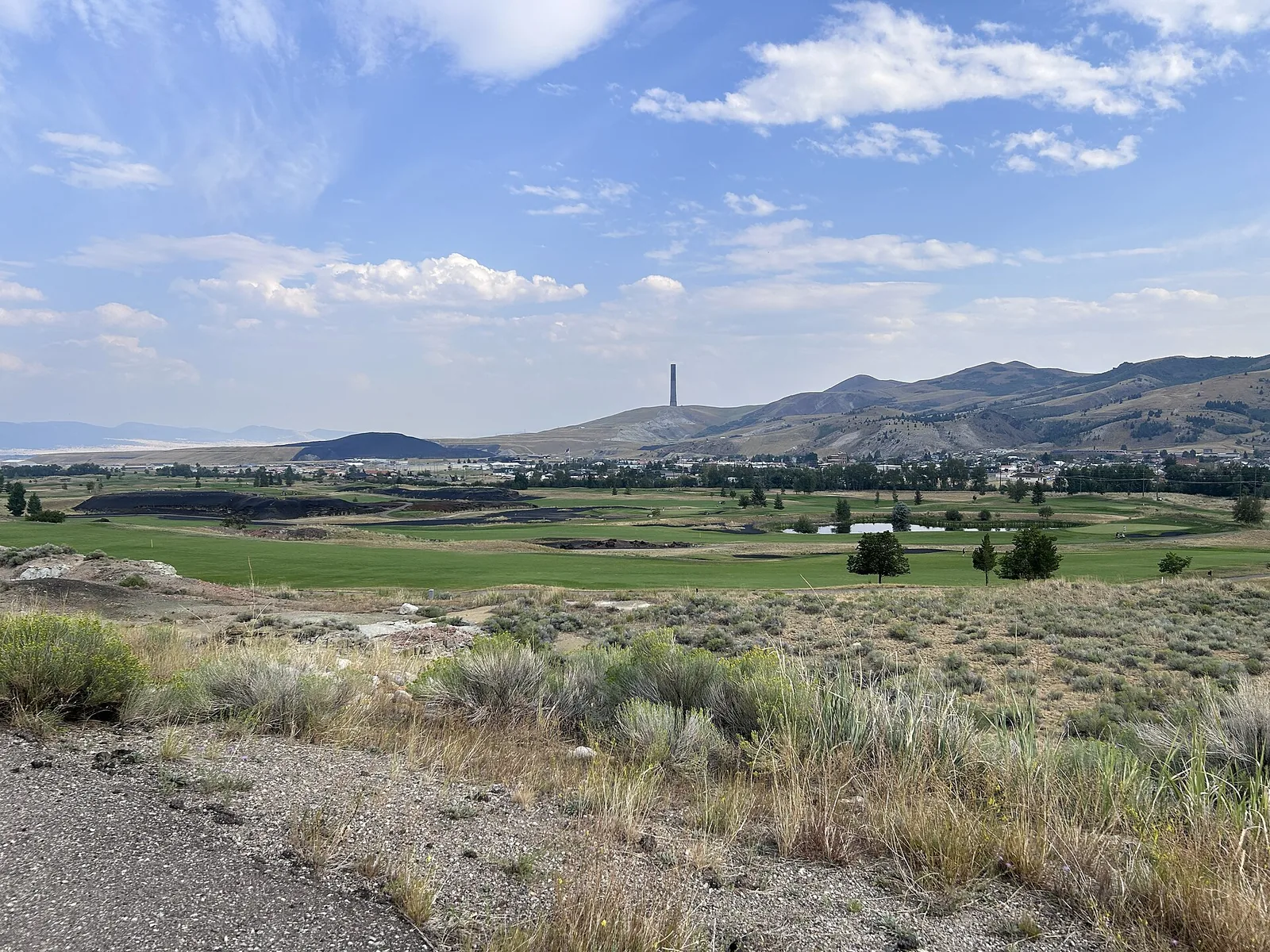 Old Works golf course with the Anaconda Smelter Stack visible across the valley.